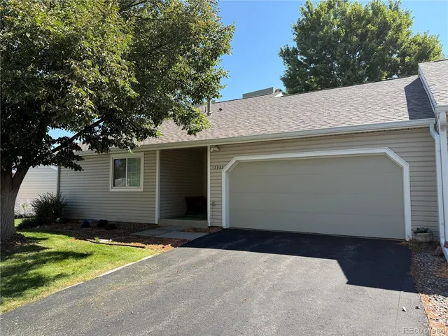 a view of a house with a garage