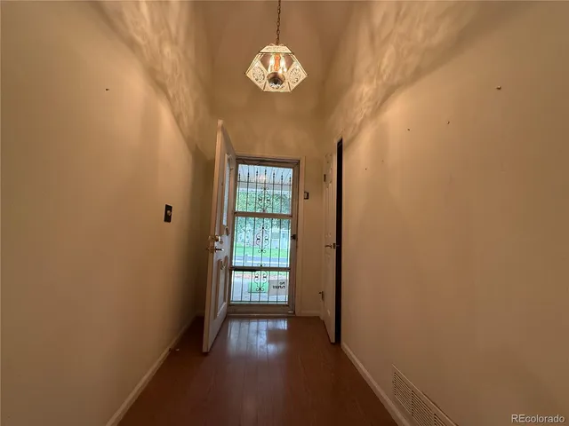 a kitchen with stainless steel appliances granite countertop a stove sink and cabinets
