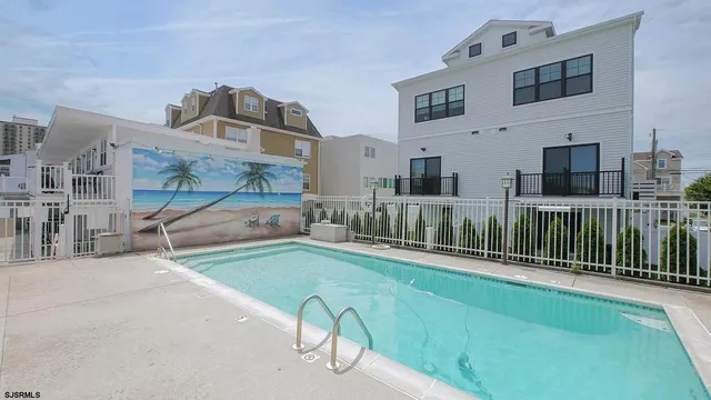 a view of a chairs and table in a patio