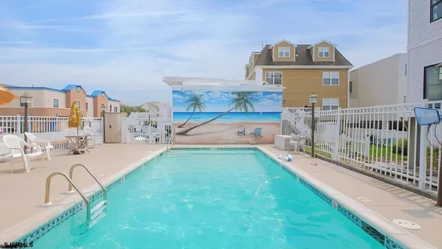 a view of a house with a swimming pool