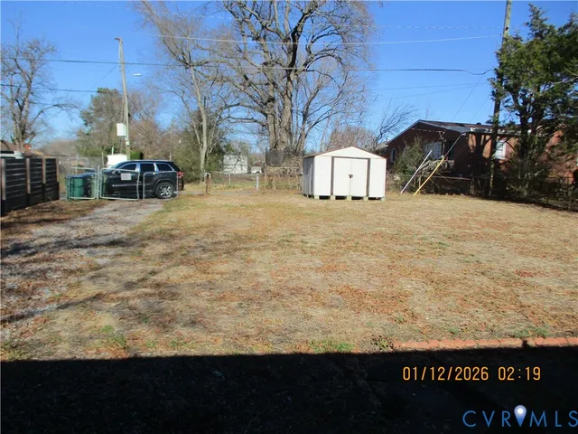 a view of outdoor space yard and parking