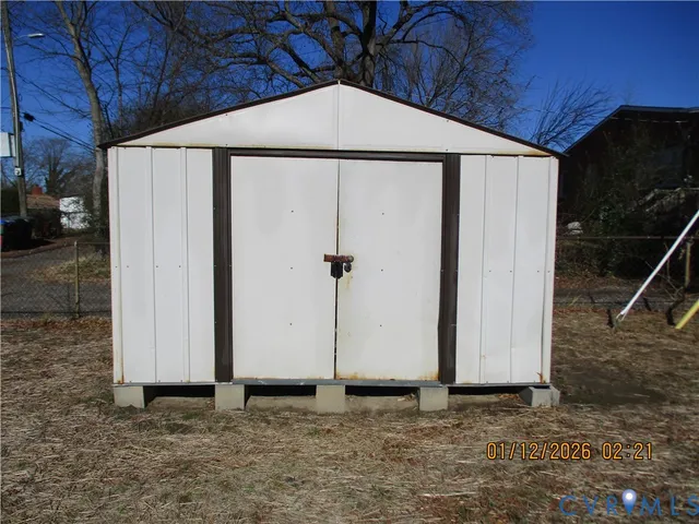 a view of a utility room with shower