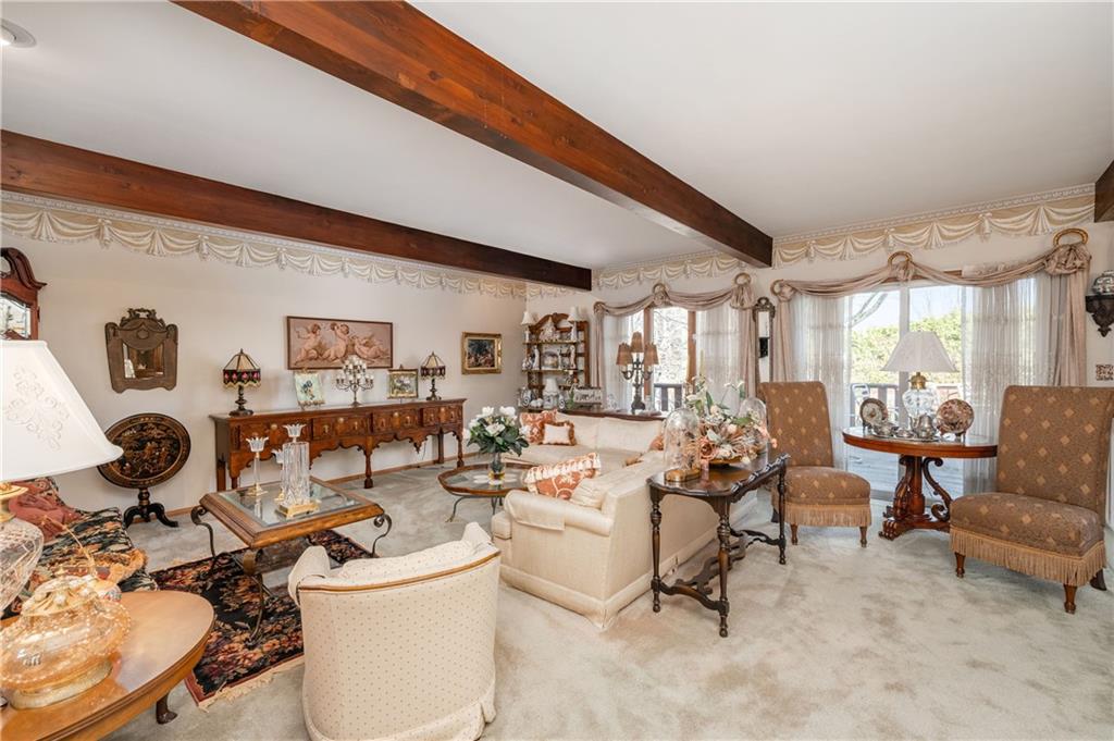 1695 Highland Road Sharon, PA 16146 - Photo 7 of 48 Neutral decor with wood ceiling beams