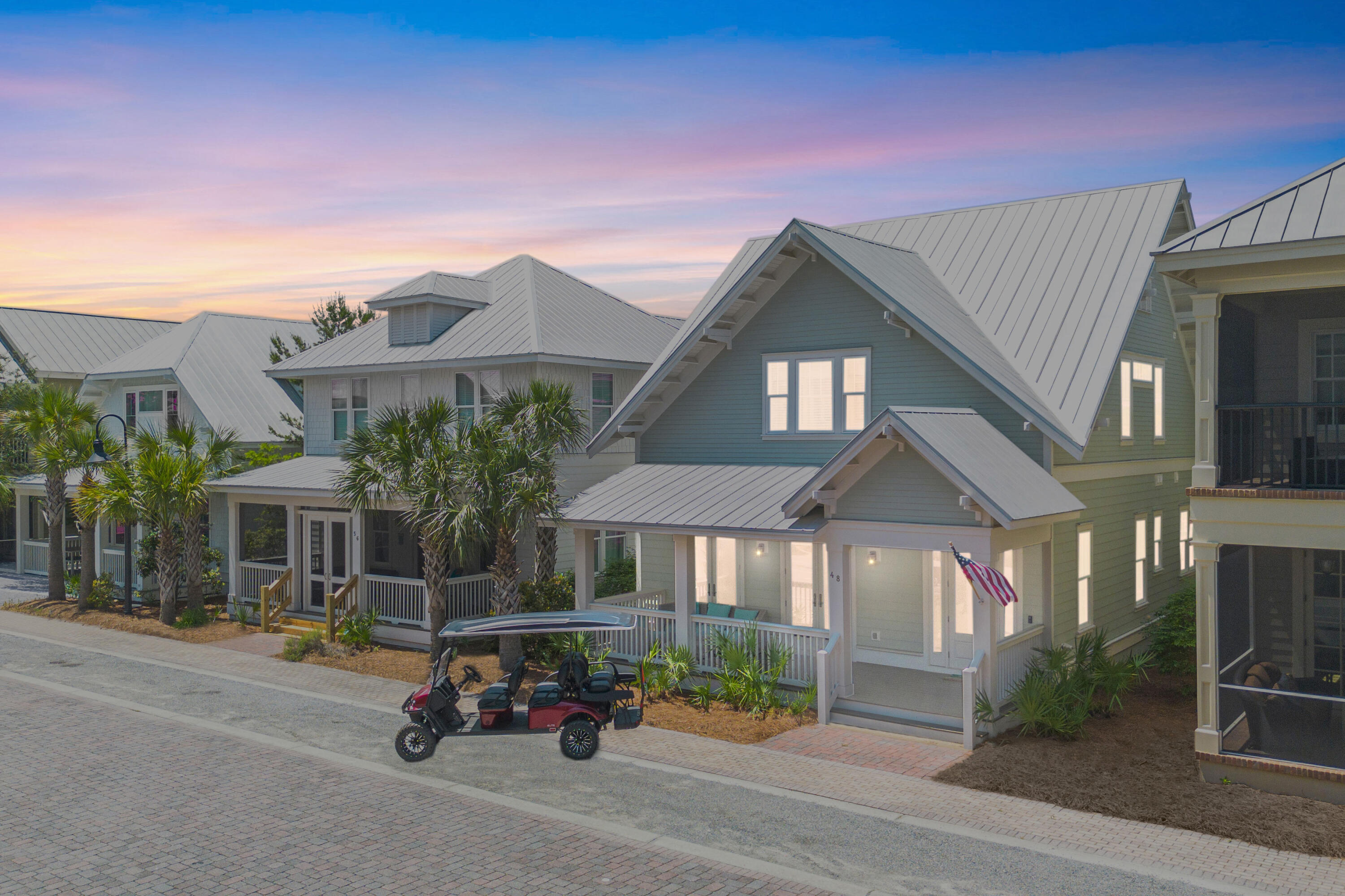 48 Pleasant Street Inlet Beach, FL 32461 - Photo 1 of 60 a car parked in front of a house
