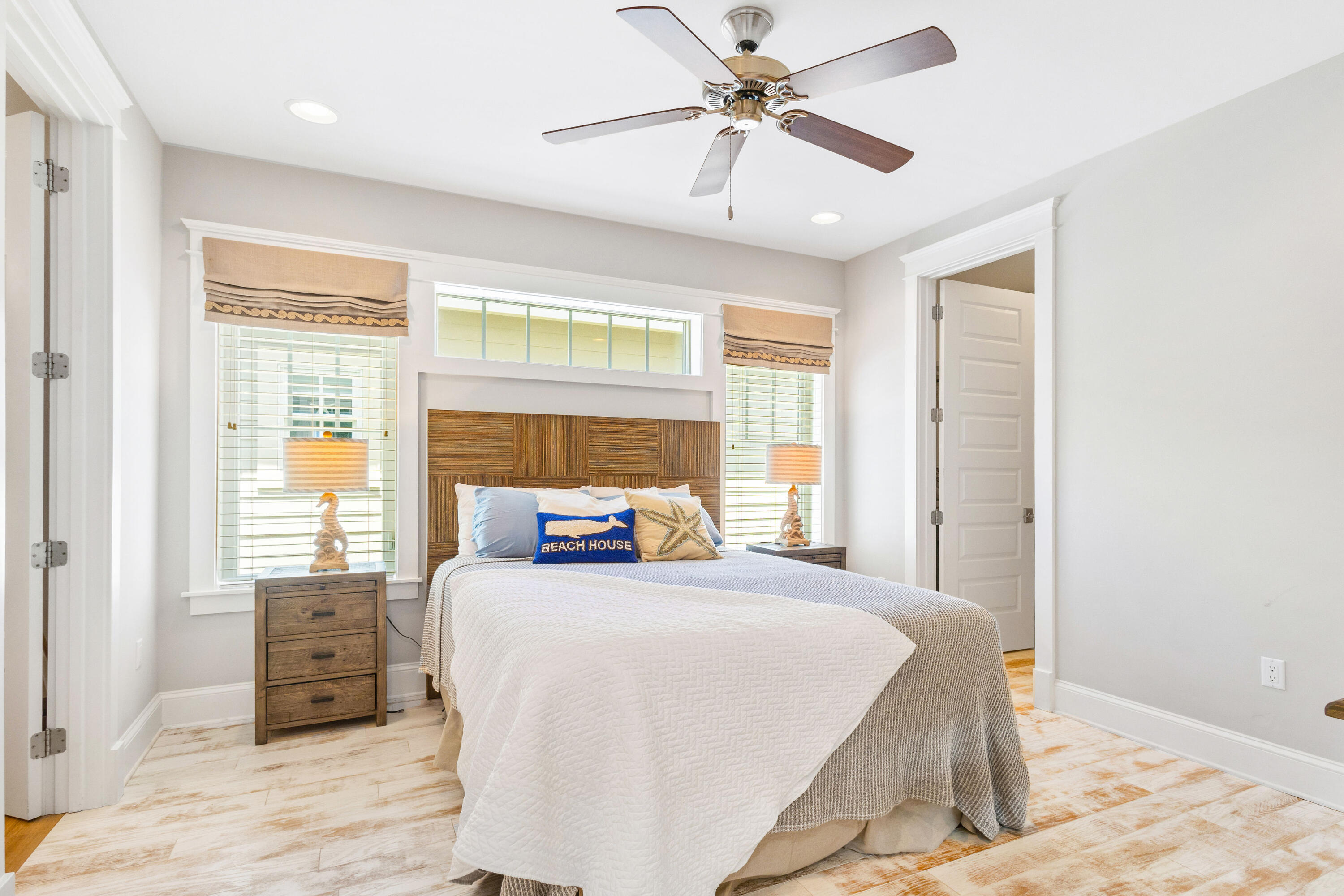 48 Pleasant Street Inlet Beach, FL 32461 - Photo 32 of 60 a bedroom with a large bed and a window