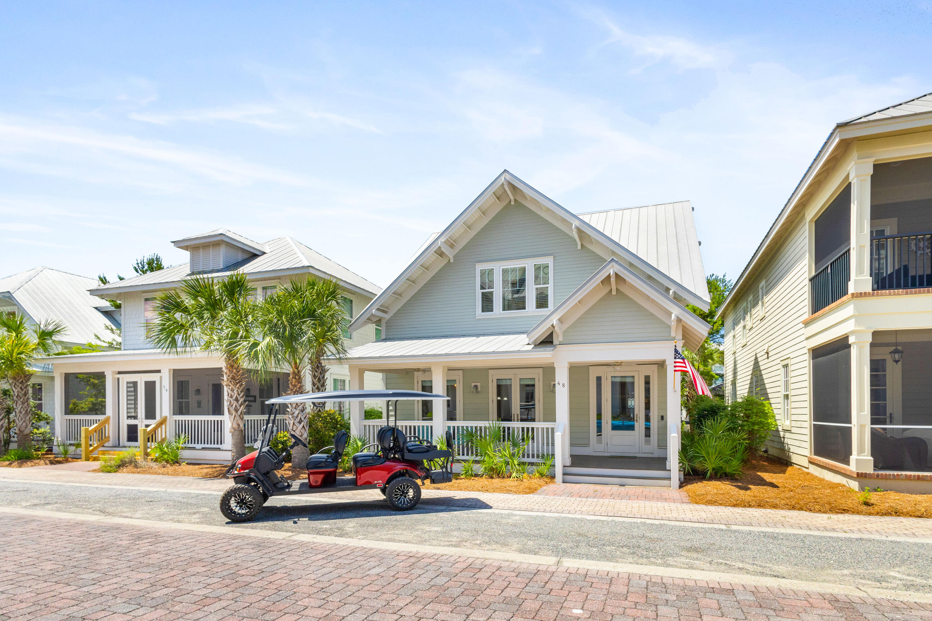 48 Pleasant Street Inlet Beach, FL 32461 - Photo 49 of 60 a car parked in front of a house
