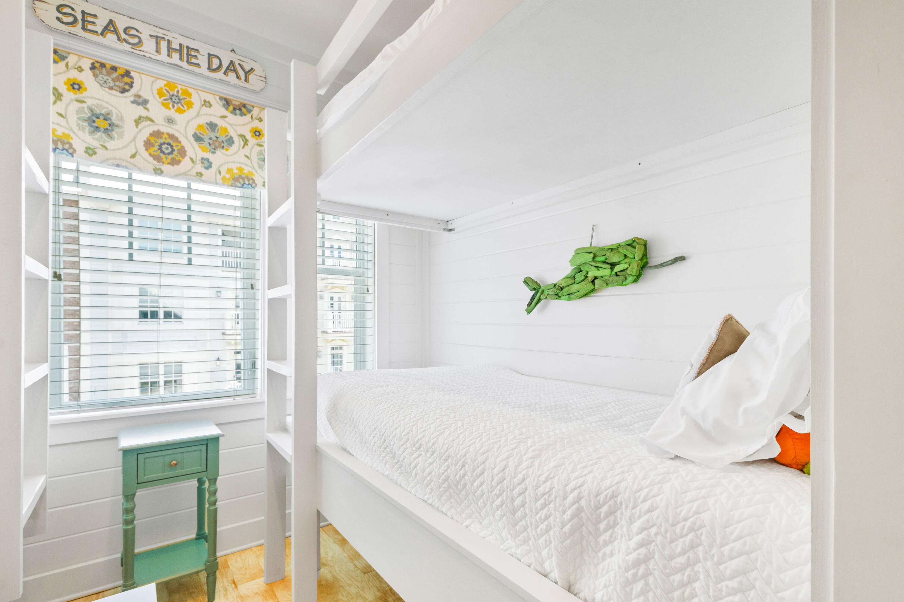 48 Pleasant Street Inlet Beach, FL 32461 - Photo 51 of 60 a bedroom with a bed and a window