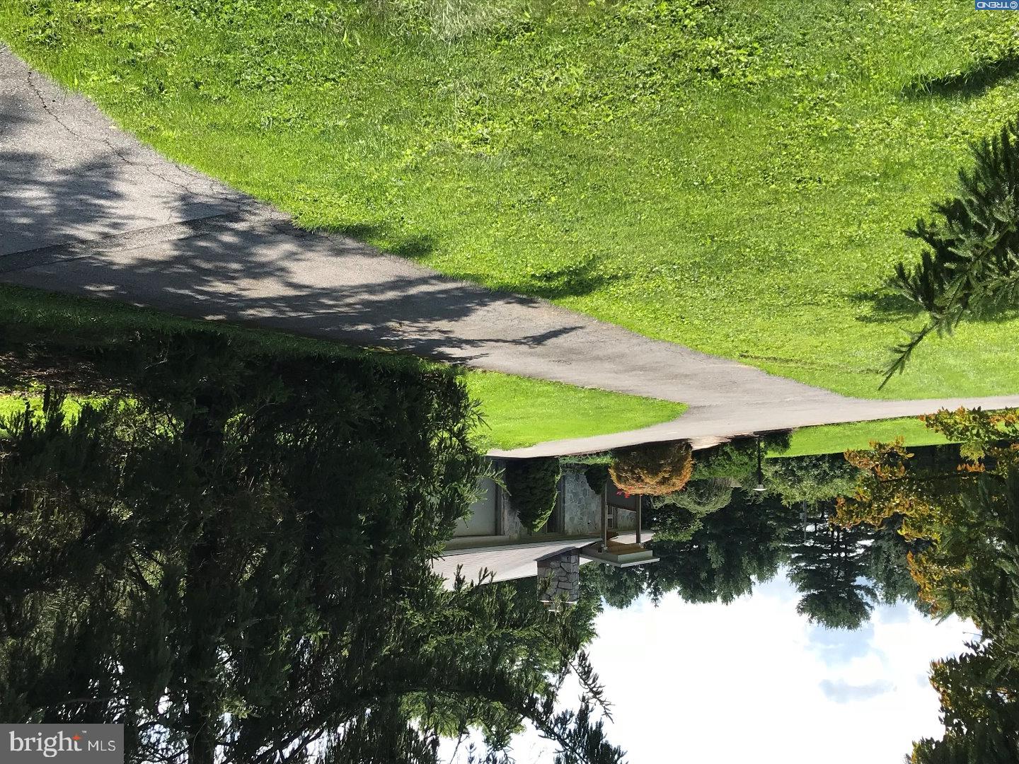 60 Peach Tree Lane Sinking Spring, PA 19608 - Photo 1 of 25 a view of a backyard of the house