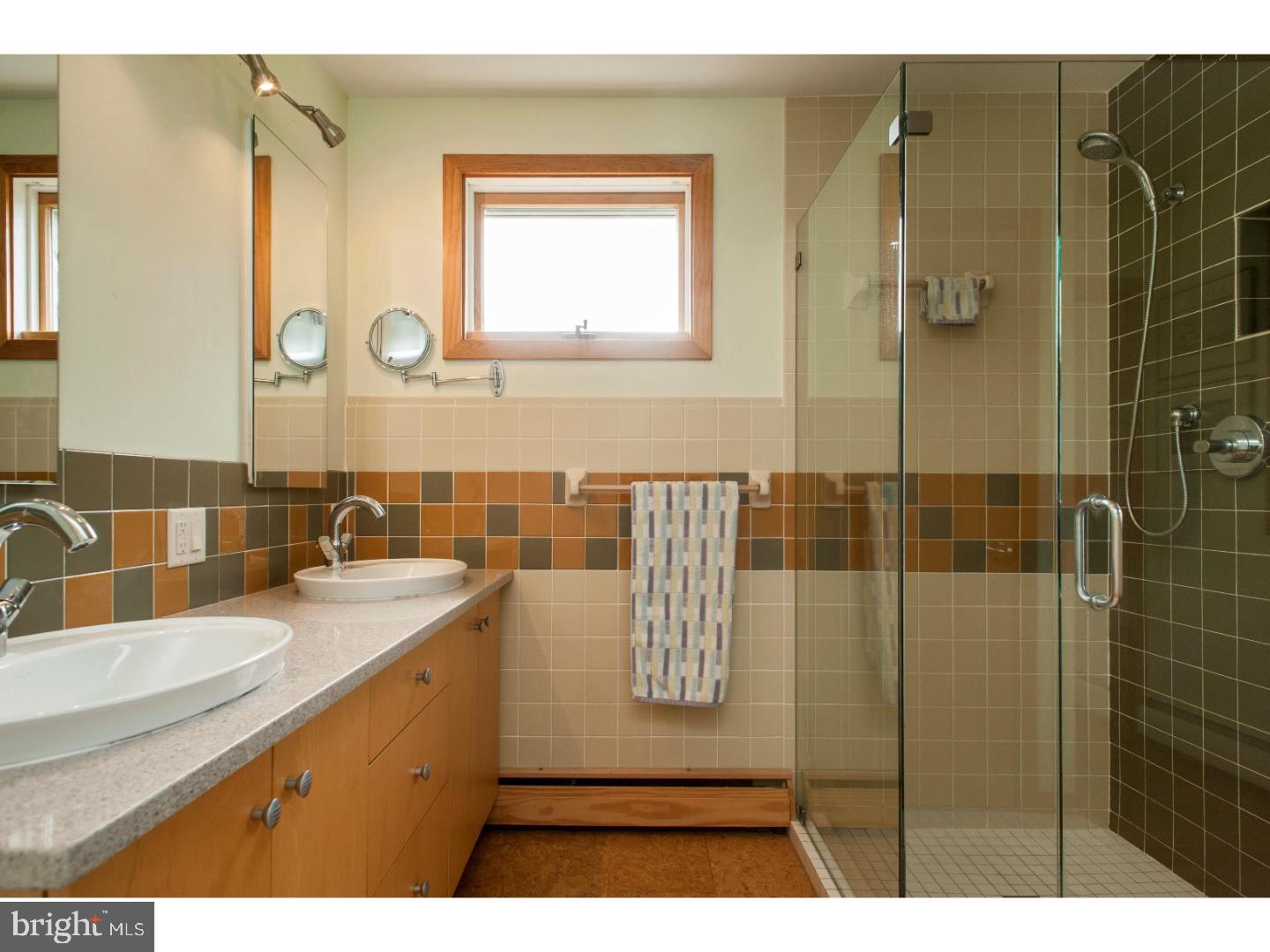 60 Peach Tree Lane Sinking Spring, PA 19608 - Photo 21 of 25 a bathroom with a granite countertop sink a mirror and shower