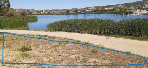 a view of lake with mountain in the background