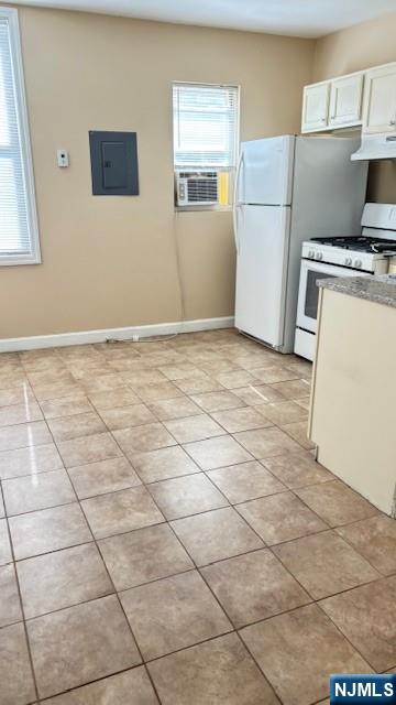 321 John Street, Unit REAR Harrison, NJ 07029 - Photo 8 of 19 a kitchen with a stove a refrigerator and a sink