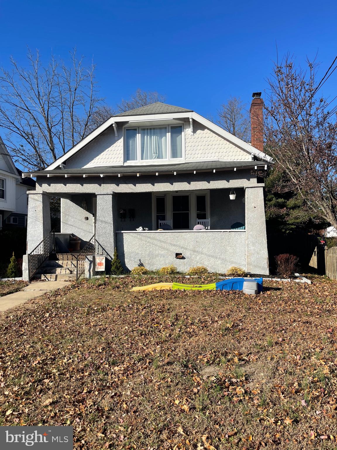 368 Pitman Avenue Pitman, NJ 08071 - Photo 2 of 22 a front view of a house with a yard