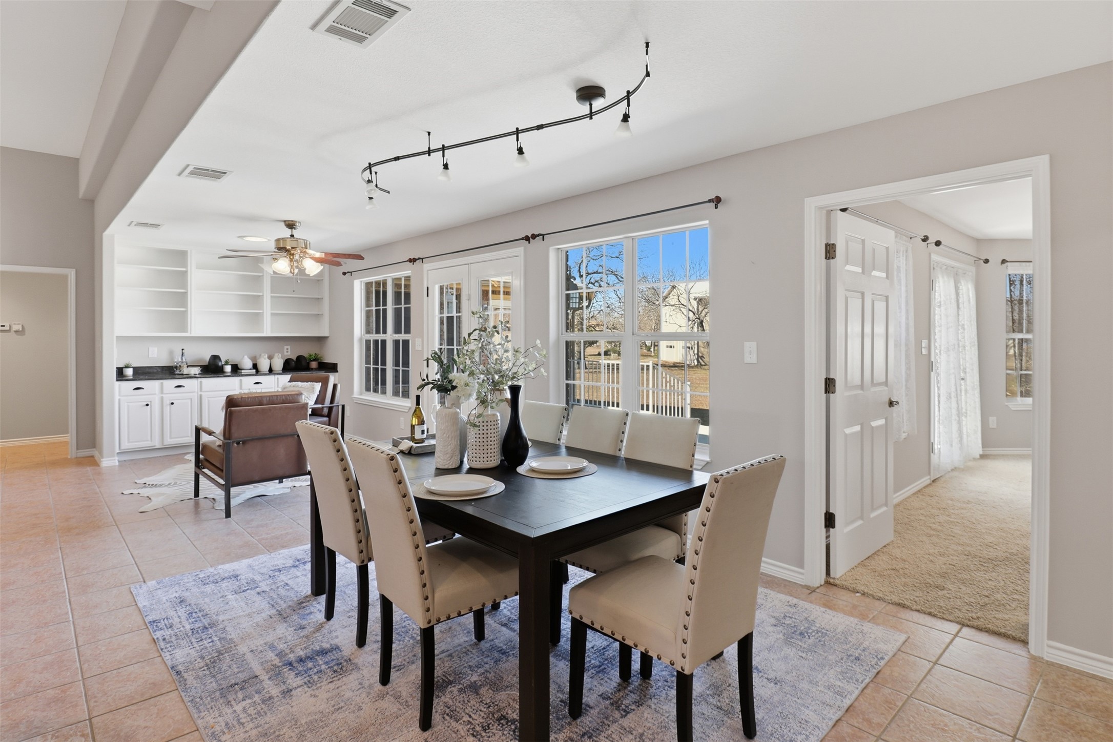 200 Apache Trail Burnet, TX 78611 - Photo 17 of 40 Dining space featuring light tile patterned floors and track lighting