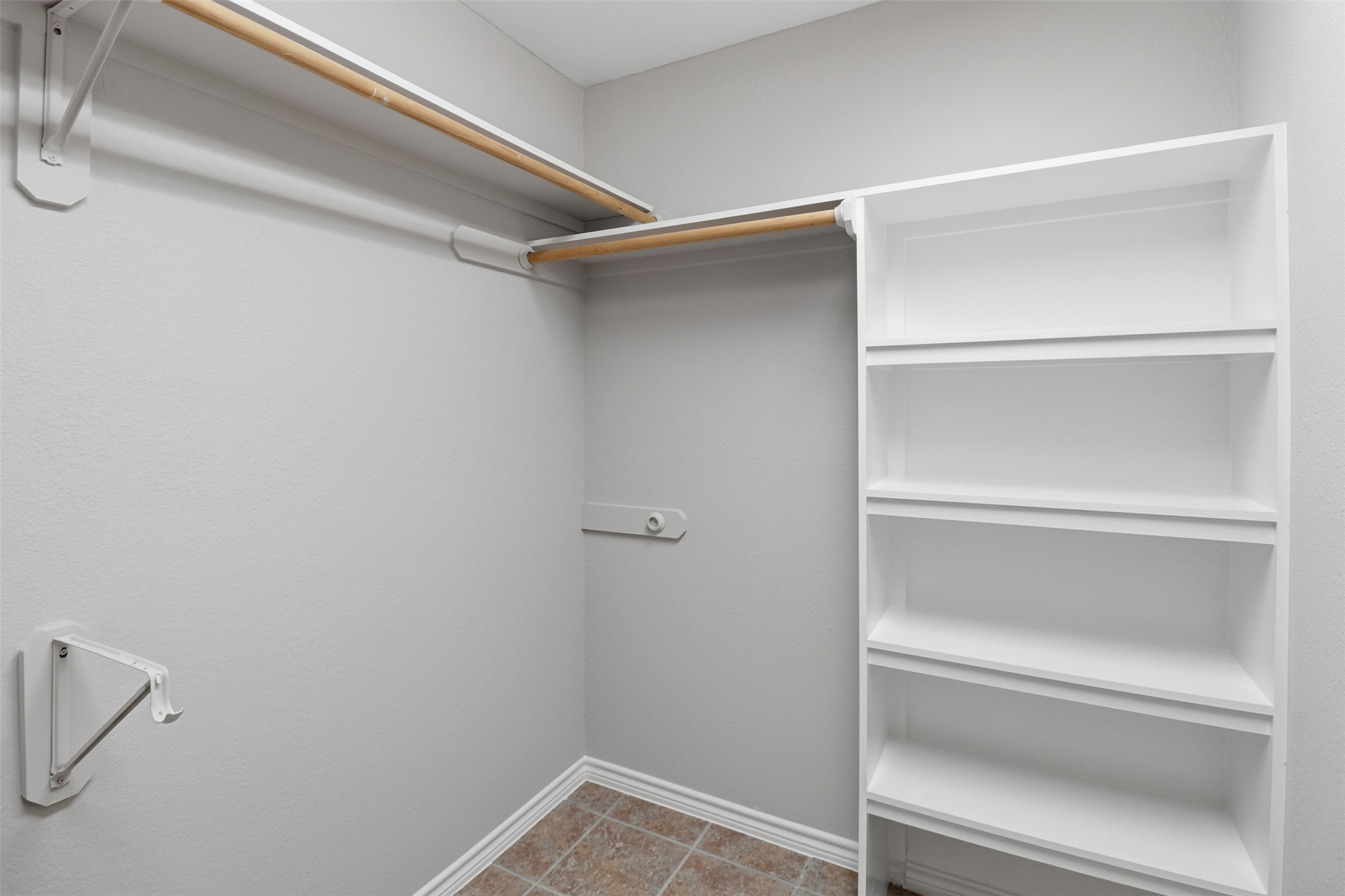 200 Apache Trail Burnet, TX 78611 - Photo 26 of 40 Walk in closet with light tile patterned flooring