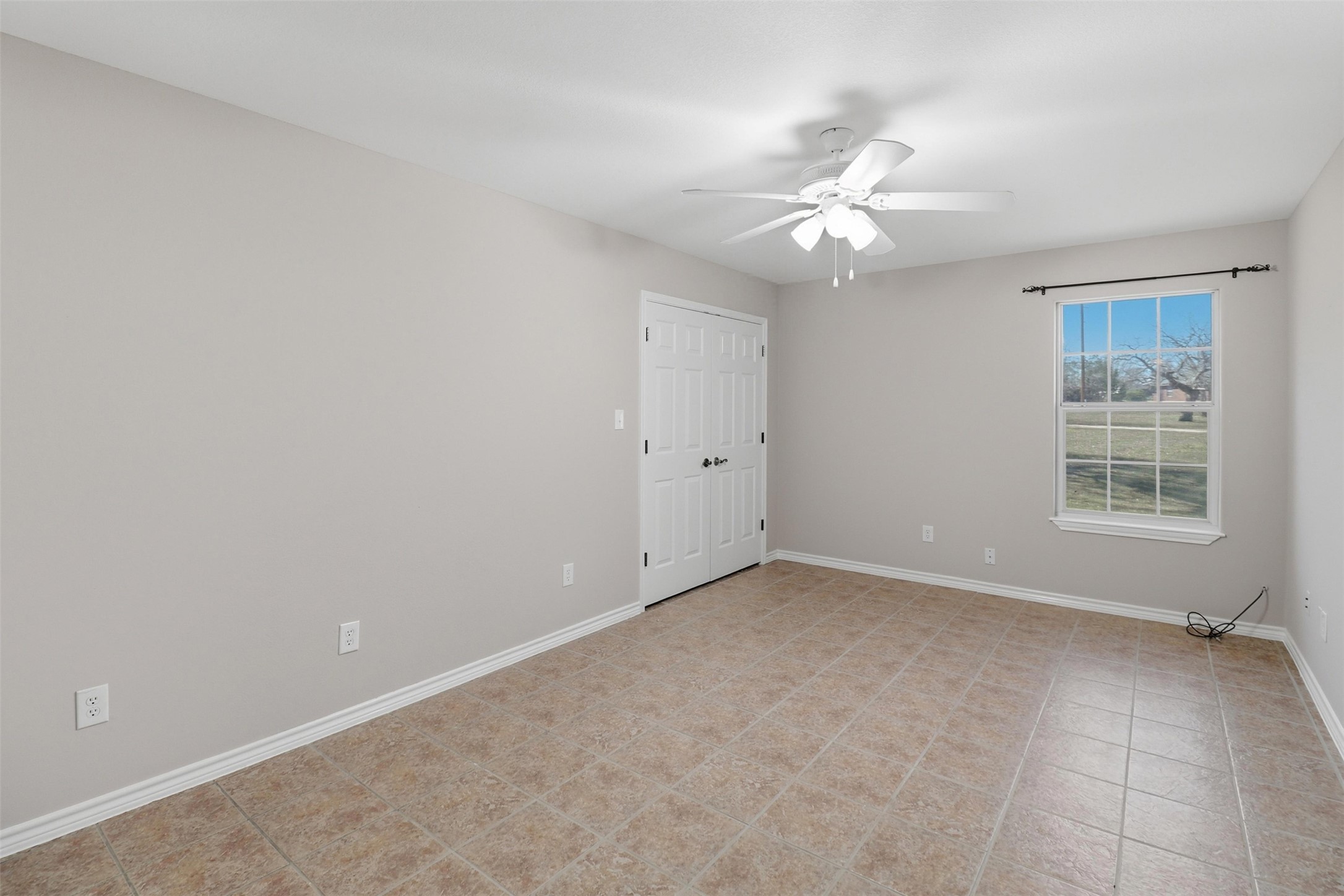 200 Apache Trail Burnet, TX 78611 - Photo 27 of 40 Empty room featuring baseboards and ceiling fan