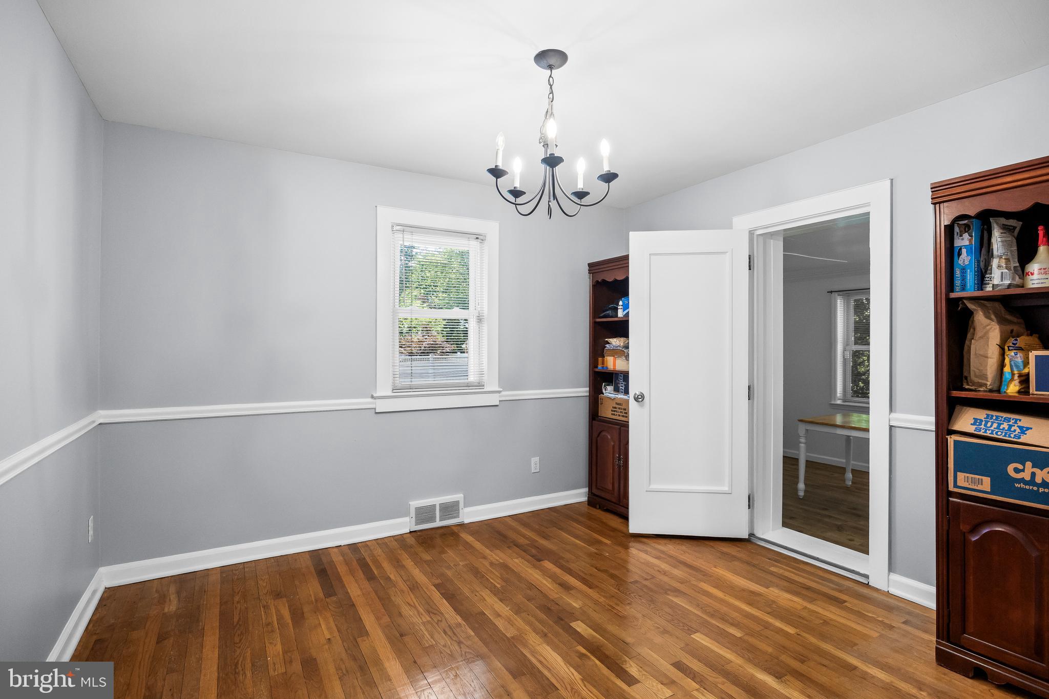 120 Lejune Road Cinnaminson, NJ 08077 - Photo 11 of 23 a view of livingroom with hardwood floor and a window