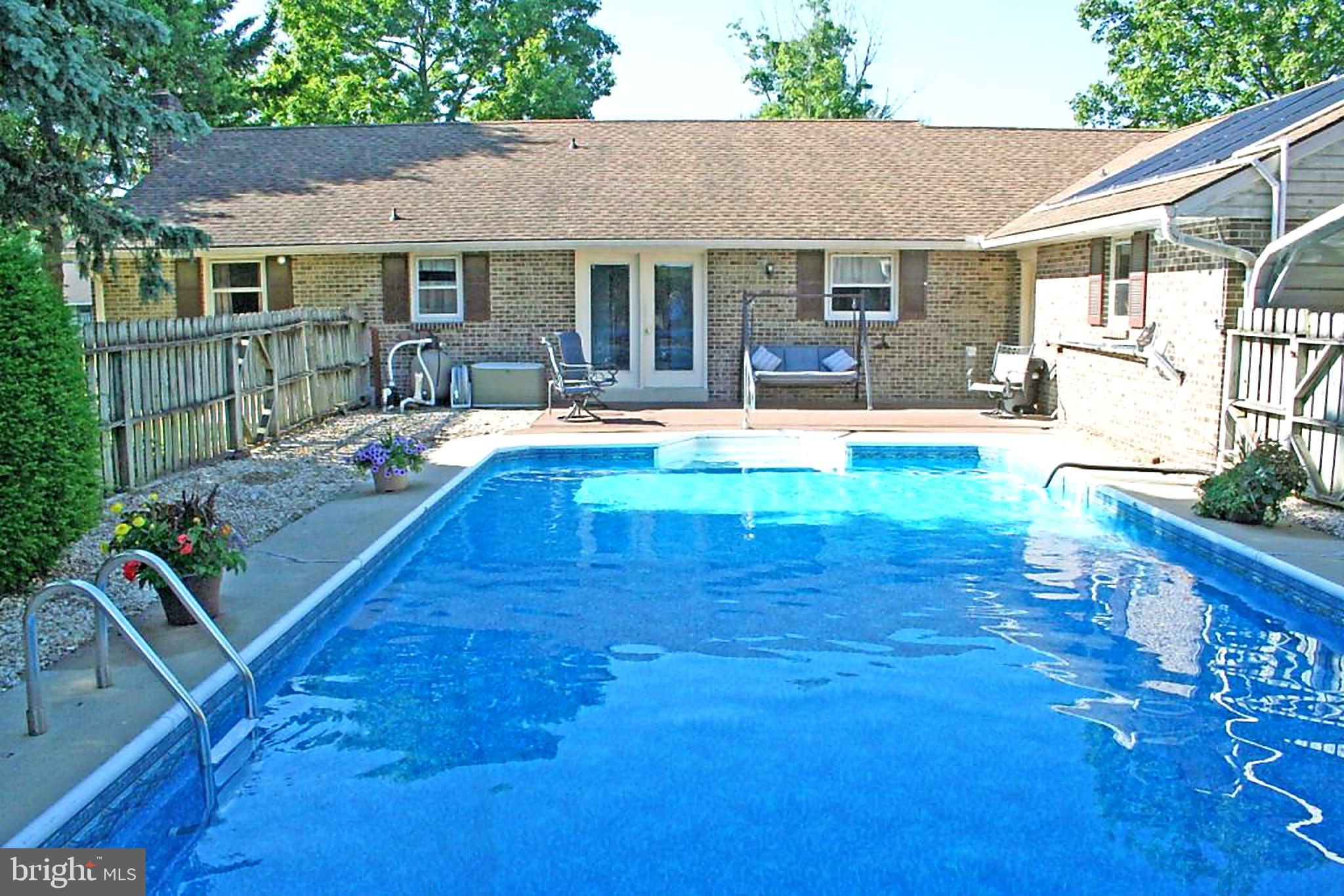 922 May Road Lititz, PA 17543 - Photo 15 of 18 a view of a house with swimming pool yard and patio