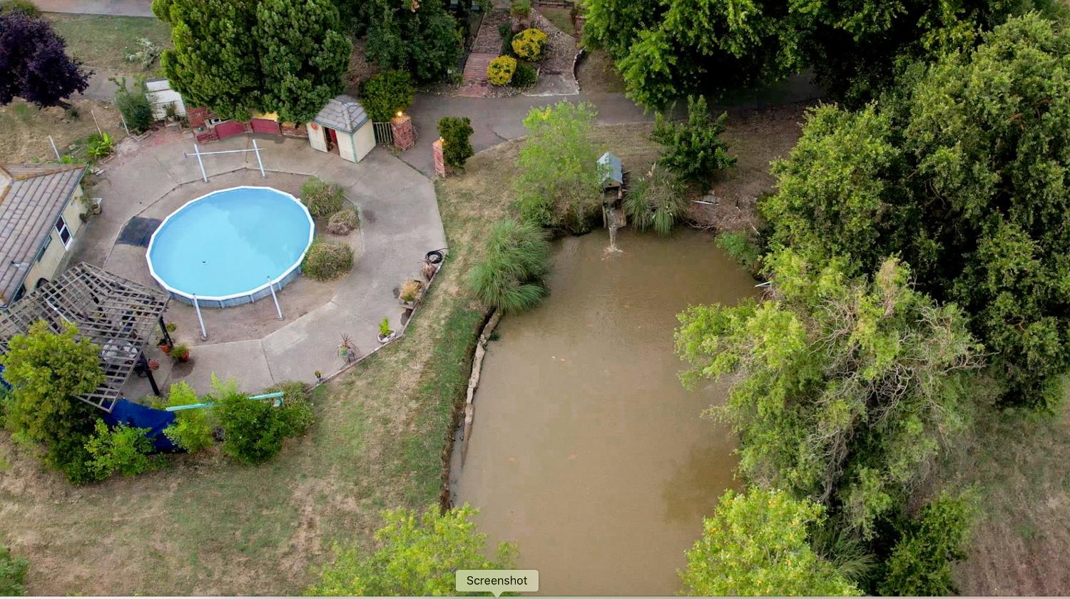 12900 Ivie Road Herald, CA 95638 - Photo 54 of 85 Aerial shows proximity of pool and pond.
