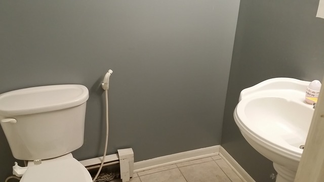 14547 Keystone Avenue, Unit 4 Midlothian, IL 60445 - Photo 7 of 8 a bathroom with a toilet and a mirror