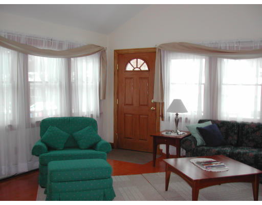 14 Charlotte Road Ipswich, MA 01938 - Photo 6 of 10 a living room with furniture and a window