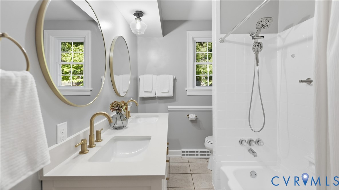 2301 Traymore Road North Chesterfield, VA 23235 - Photo 29 of 67 Dual vanity with gold-finish fixtures and hardware