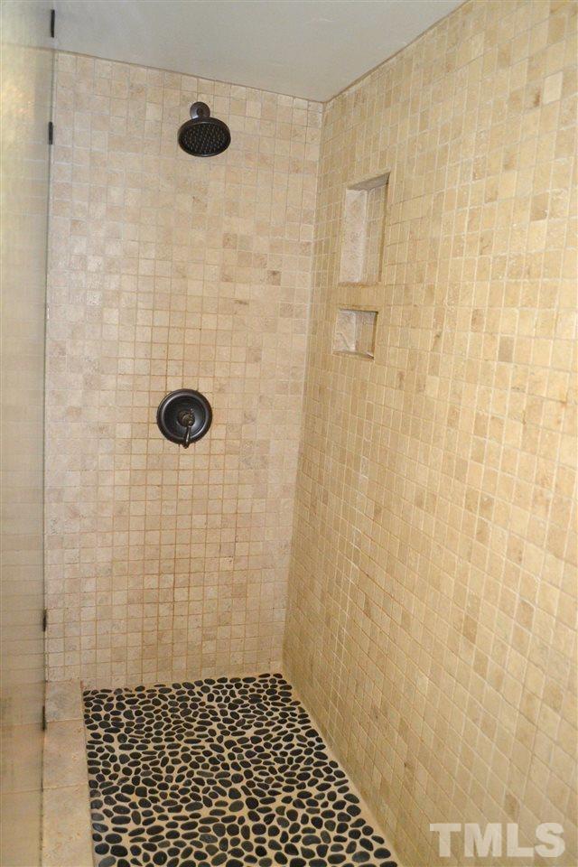 10769 Beaver Dam Road Middlesex, NC 27557 - Photo 11 of 14 a bathroom with a shower