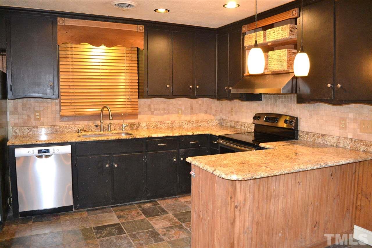 10769 Beaver Dam Road Middlesex, NC 27557 - Photo 7 of 14 a kitchen with a sink and a window