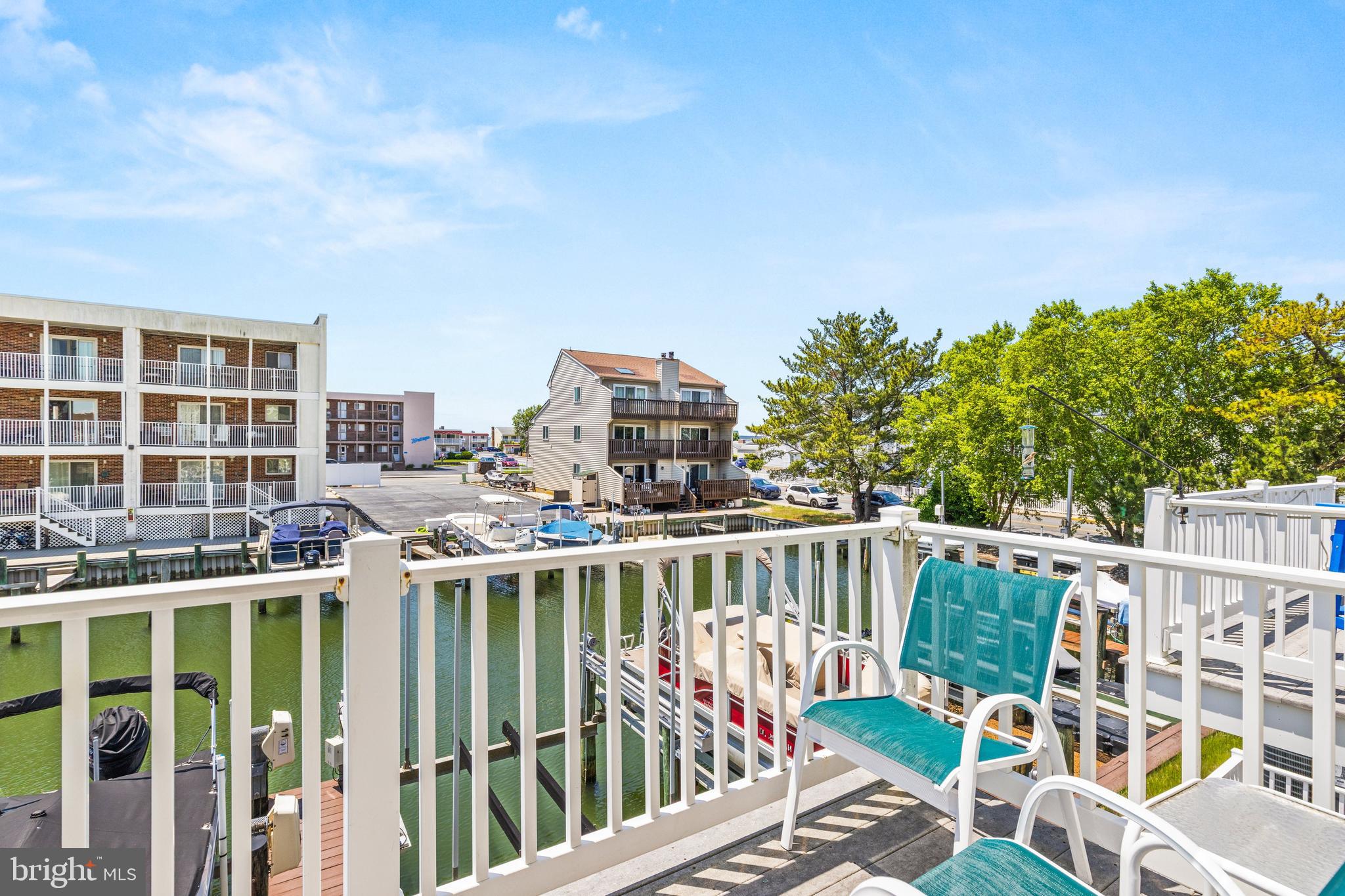 617 Salt Spray Road, Unit B Ocean City, MD 21842 - Photo 41 of 72 a balcony with an ocean view