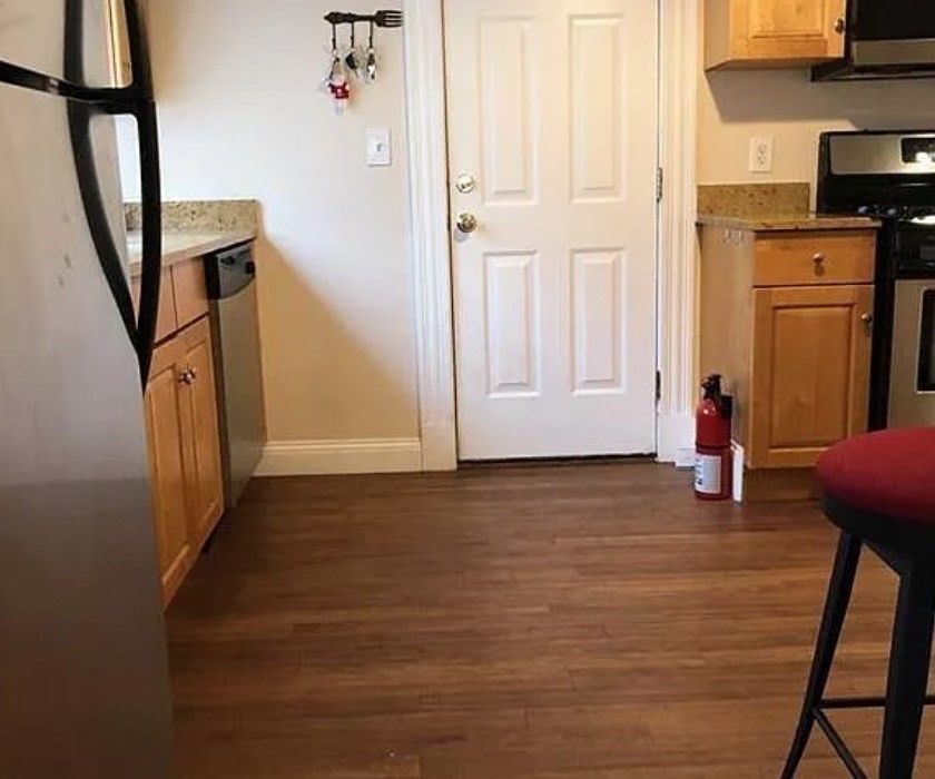 124 Selden Street Boston, MA 02124 - Photo 18 of 35 a view of a storage & utility room with stairs