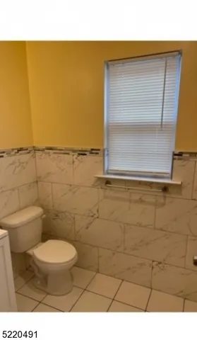 a bathroom with a toilet