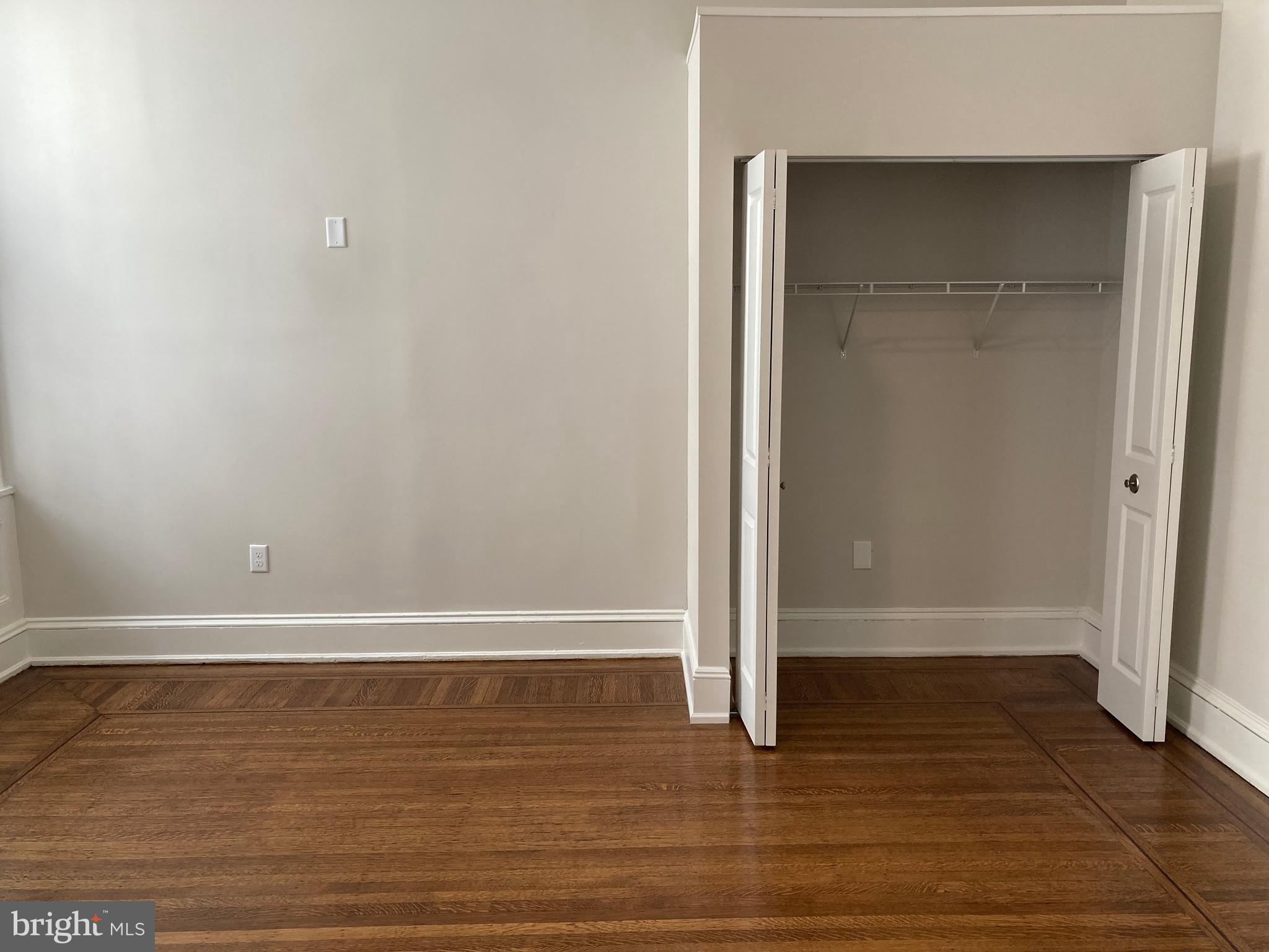 10 East Chase Street Baltimore, MD 21202 - Photo 28 of 60 a view of room with hardwood floor