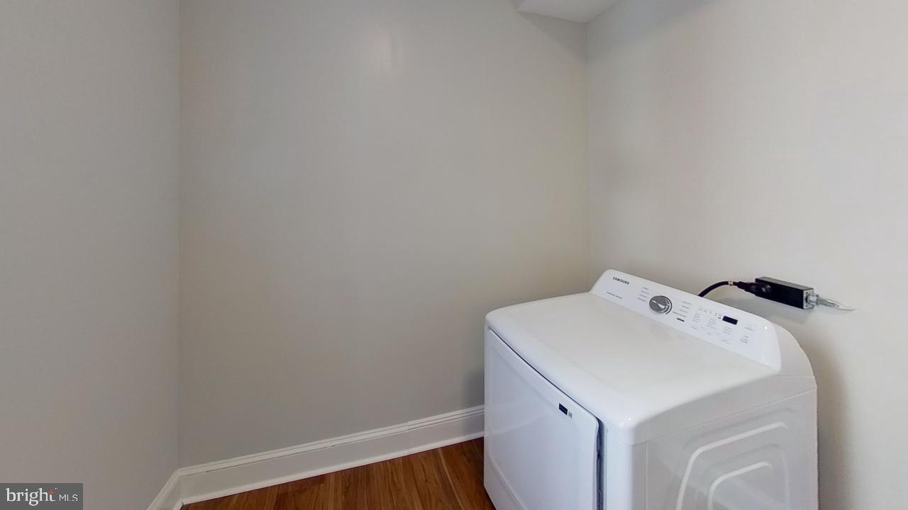 10 East Chase Street Baltimore, MD 21202 - Photo 57 of 60 a utility room with dryer and washer