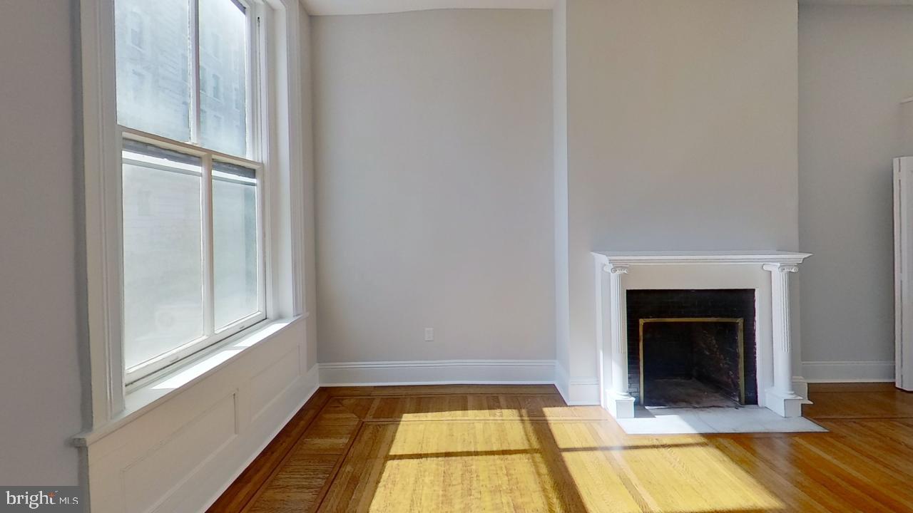 10 East Chase Street Baltimore, MD 21202 - Photo 58 of 60 a view of a livingroom with a fireplace
