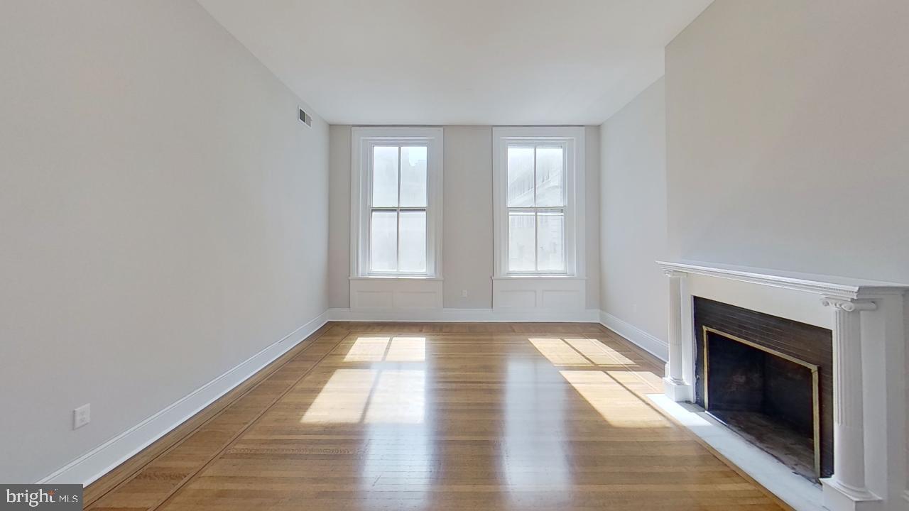 10 East Chase Street Baltimore, MD 21202 - Photo 59 of 60 a view of an empty room and window