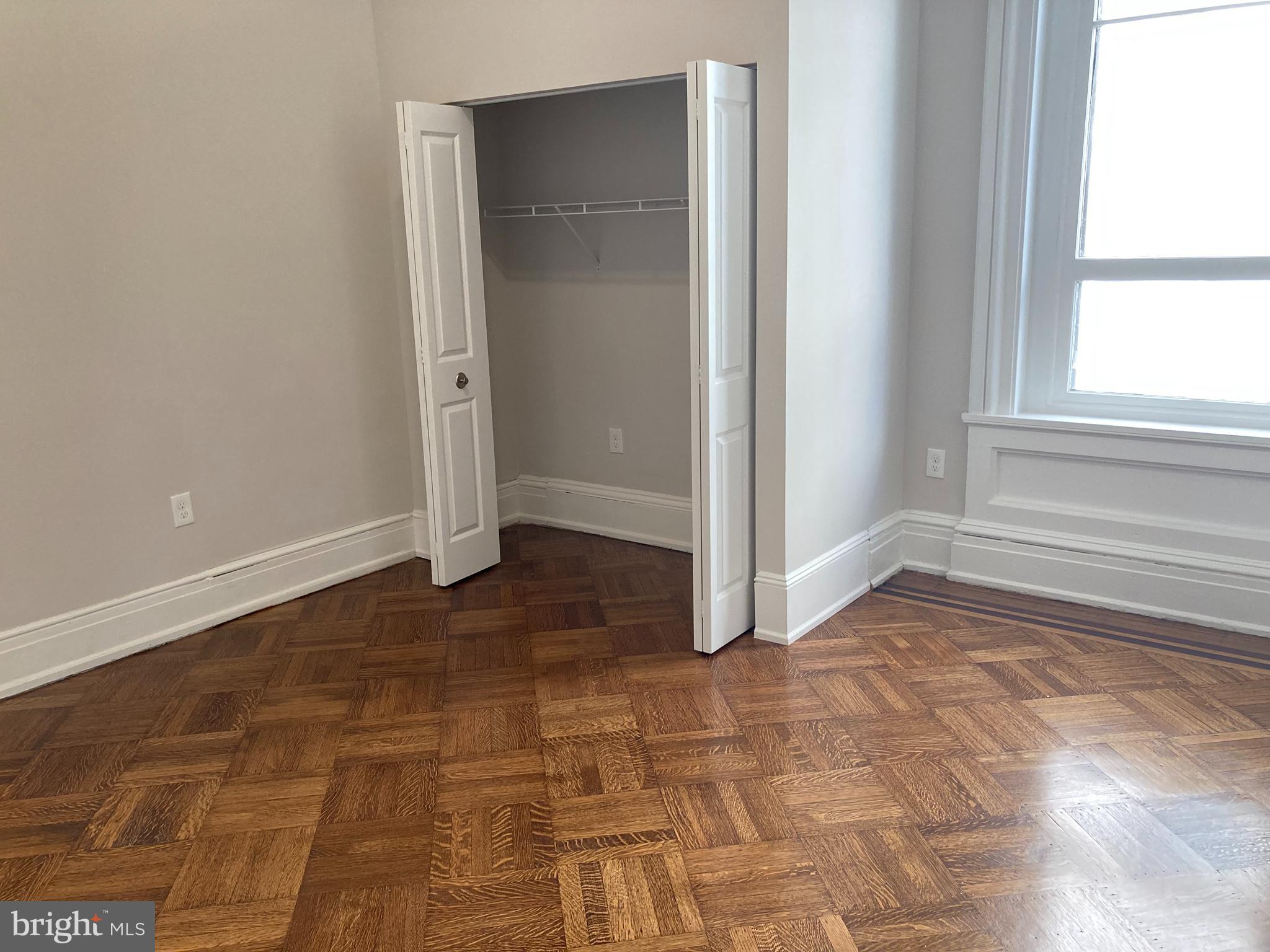 10 East Chase Street Baltimore, MD 21202 - Photo 6 of 60 a view of empty room with window