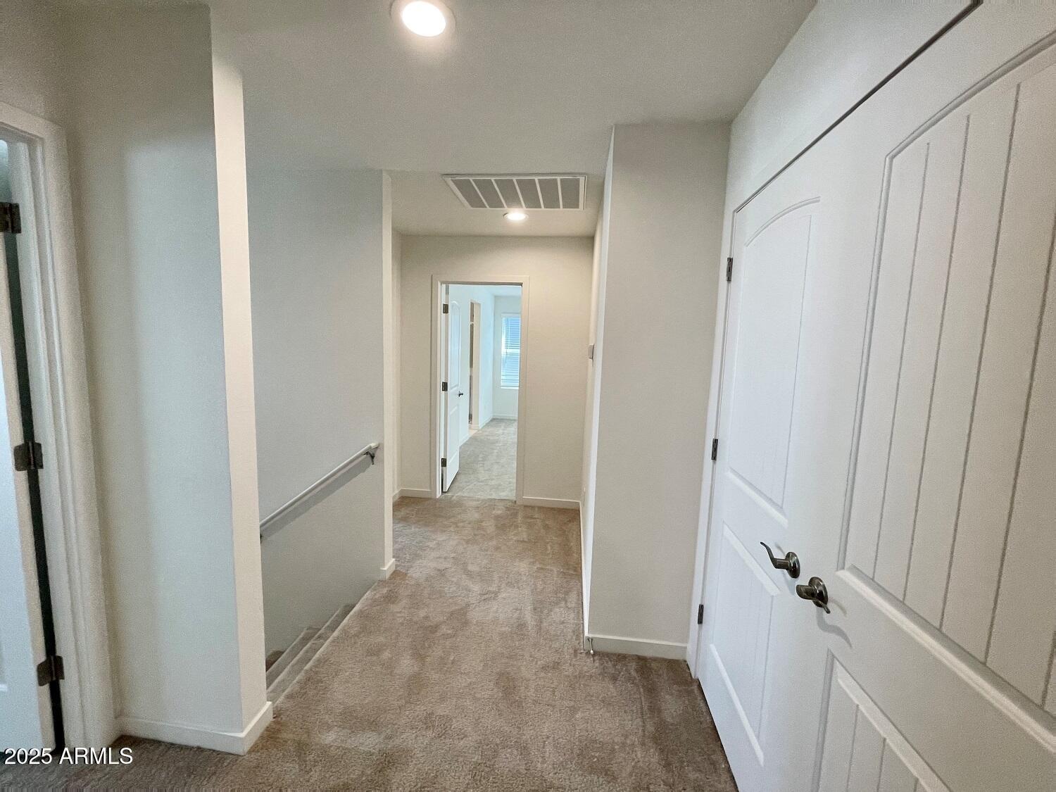 814 East Roma Avenue, Unit 2 Phoenix, AZ 85014 - Photo 11 of 20 a view of a hallway with closet and wooden floor