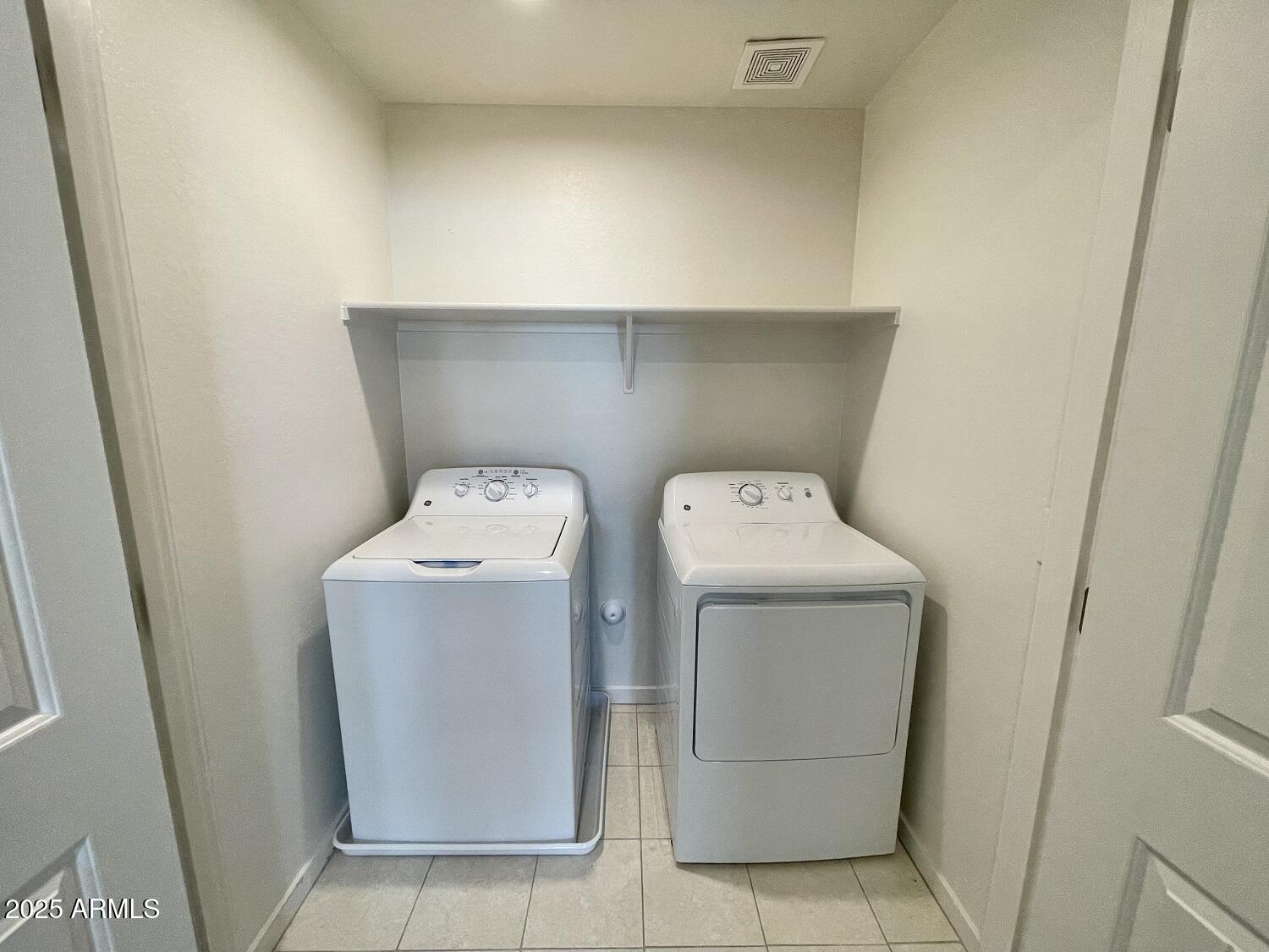 814 East Roma Avenue, Unit 2 Phoenix, AZ 85014 - Photo 12 of 20 a utility room with dryer and washer