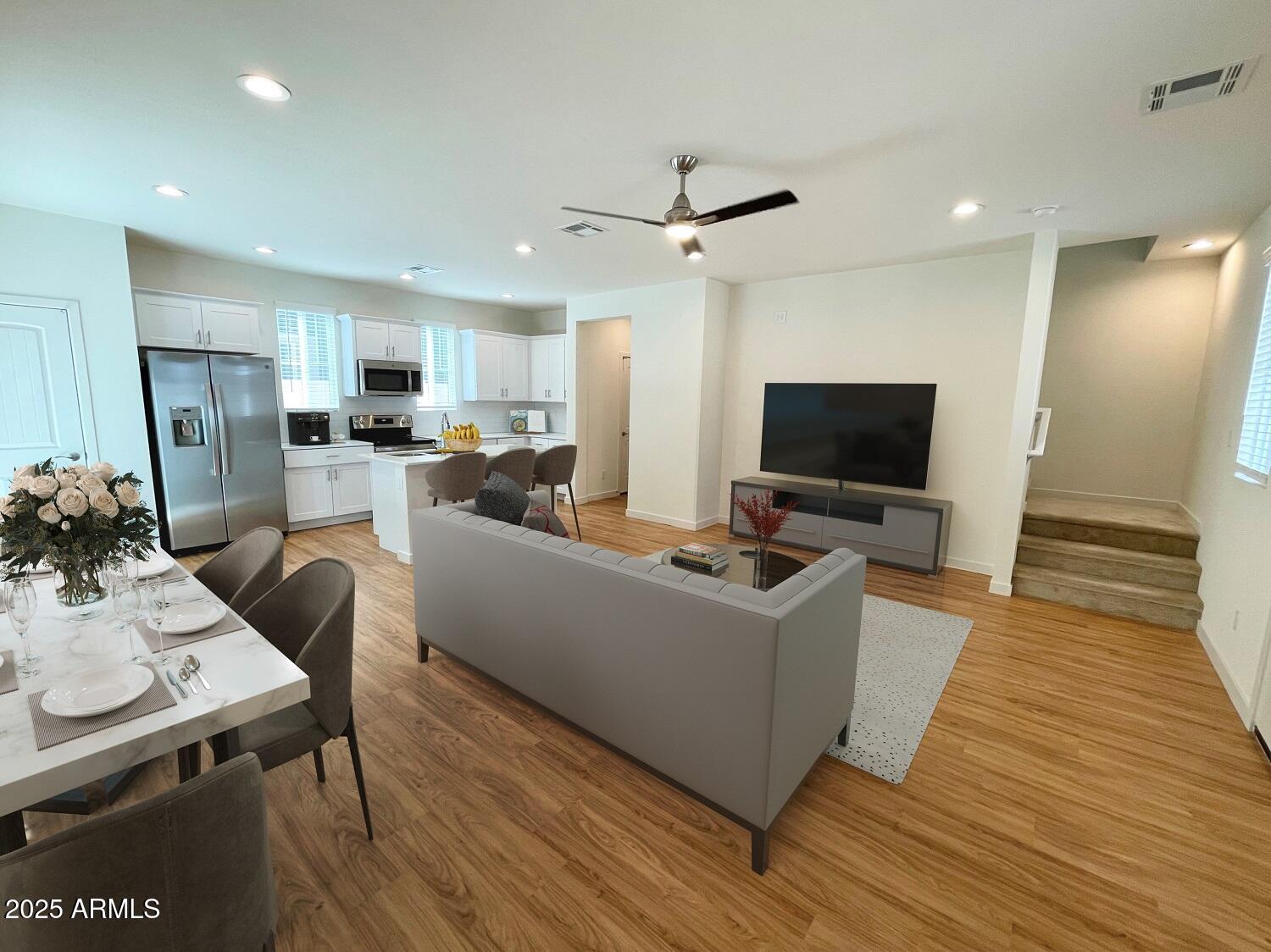 814 East Roma Avenue, Unit 2 Phoenix, AZ 85014 - Photo 5 of 20 a living room with furniture and a flat screen tv