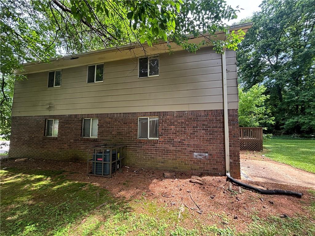 4135 Moore Road Conley, GA 30288 - Photo 10 of 10 a backyard of a house with seating space