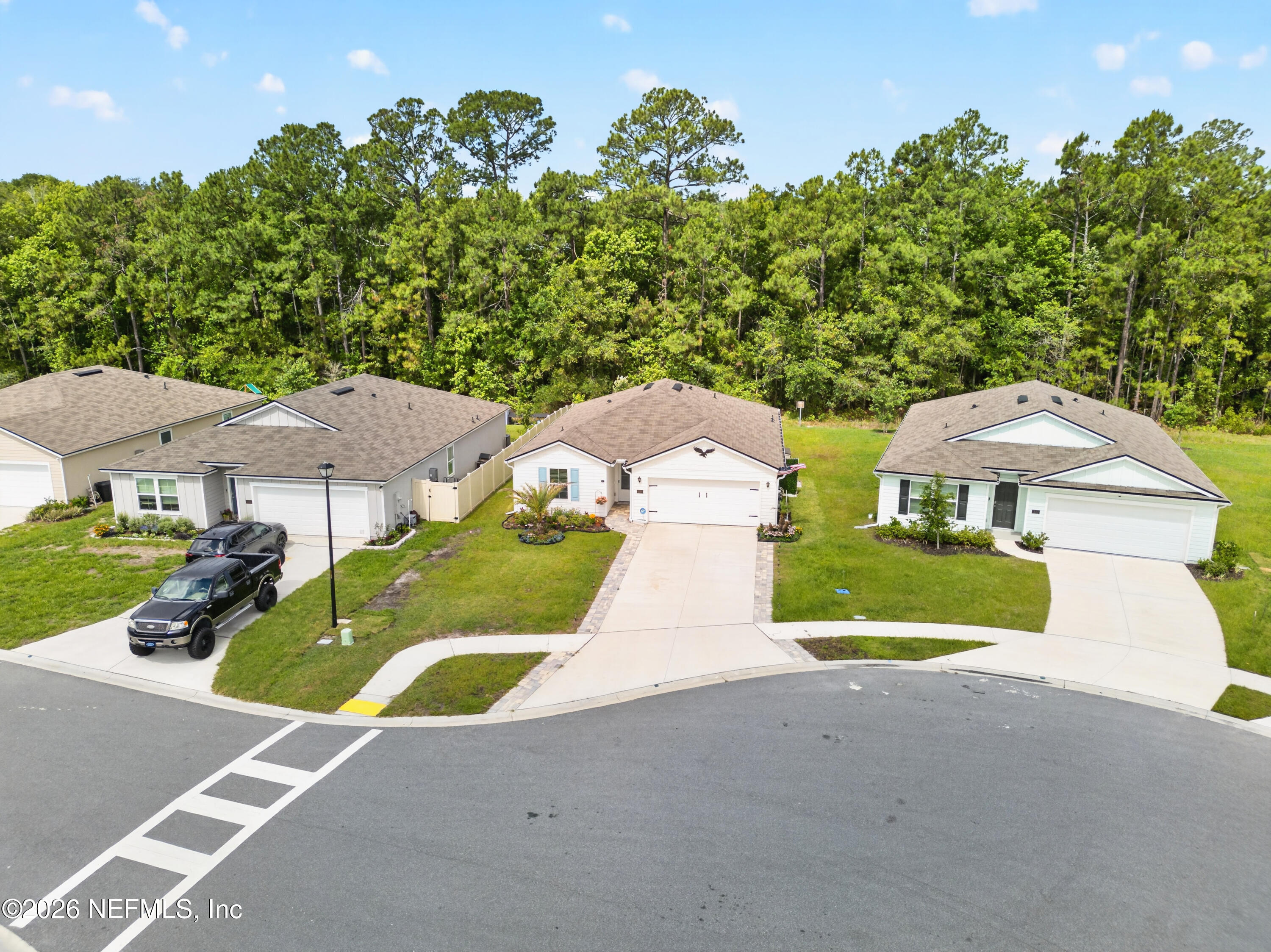 231 Encanto Way Street St. Augustine, FL 32084 - Photo 24 of 36 an aerial view of a house with swimming pool and porch