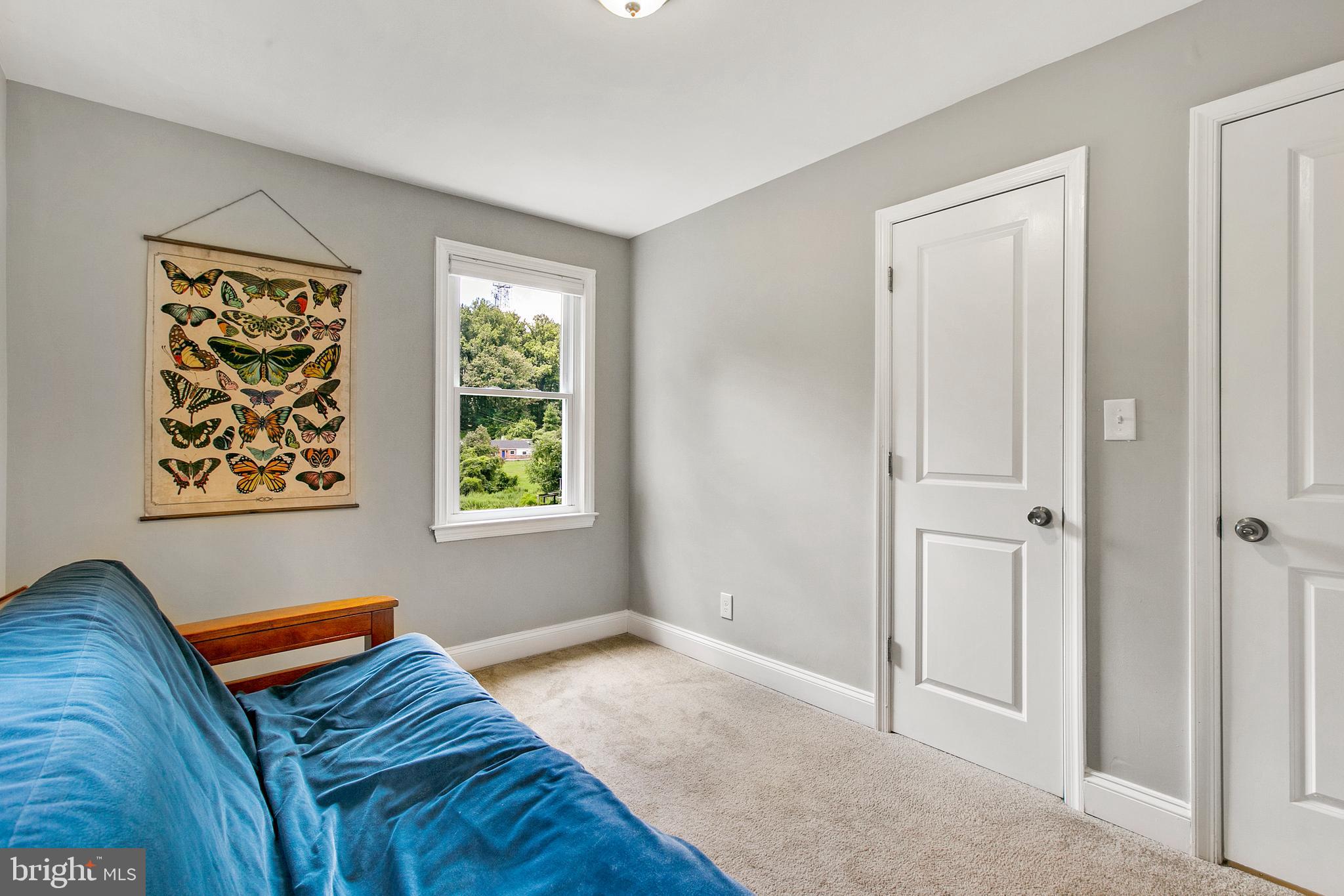 2930 Ridge Road Baltimore, MD 21244 - Photo 12 of 39 a bedroom with bed and a window