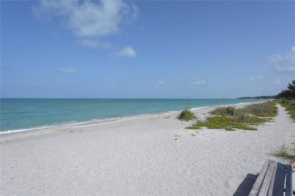 8625 Midnight Pass Road, Unit 305B Sarasota, FL 34242 - Photo 28 of 38 a view of wooden floor and lake view