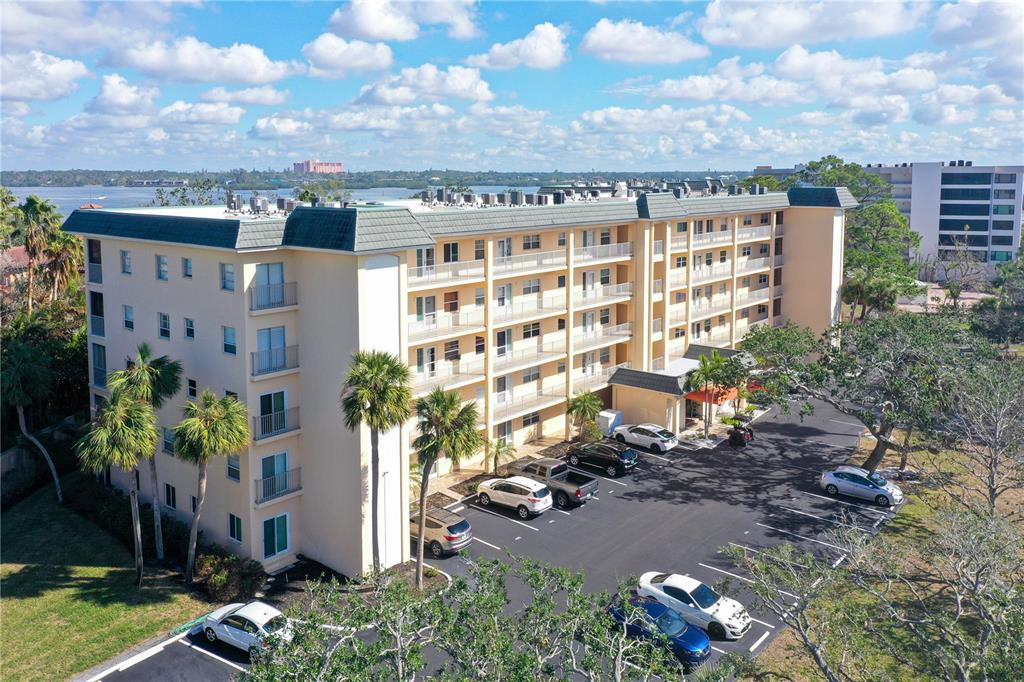 8625 Midnight Pass Road, Unit 305B Sarasota, FL 34242 - Photo 35 of 38 a view of a city with tall buildings
