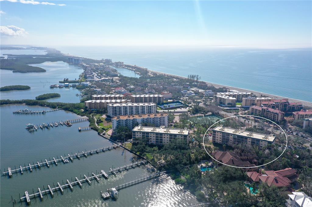 8625 Midnight Pass Road, Unit 305B Sarasota, FL 34242 - Photo 4 of 38 an aerial view of a house