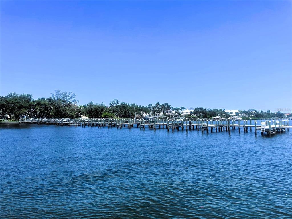 8625 Midnight Pass Road, Unit 305B Sarasota, FL 34242 - Photo 5 of 38 a view of lake with boats