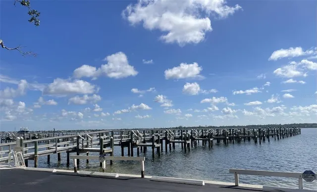 a kitchen with cabinets a sink and a stove top oven