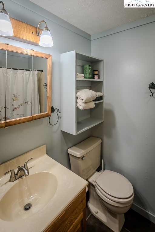 80 Avery Co High School Road Newland, NC 28657 - Photo 14 of 36 a bathroom with a sink and a toilet