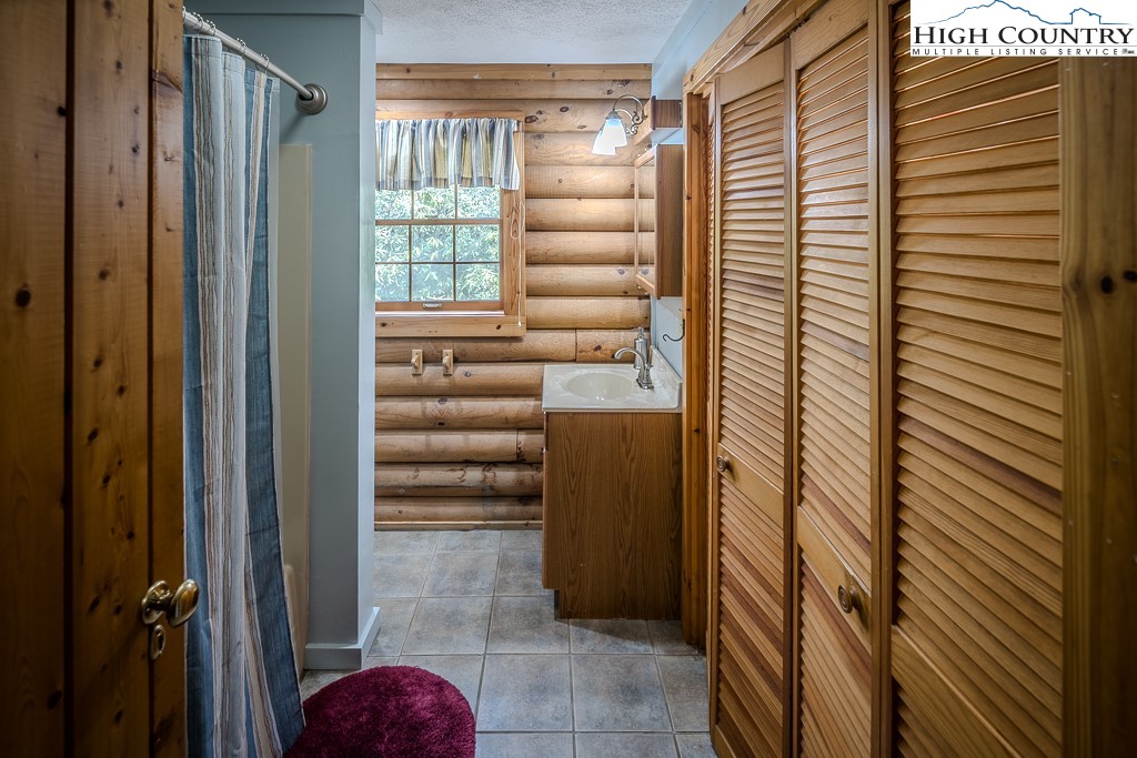 80 Avery Co High School Road Newland, NC 28657 - Photo 15 of 36 a view of entryway with bathroom and windows