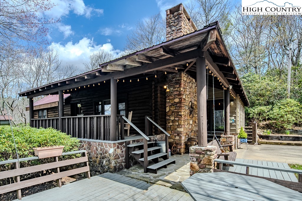 80 Avery Co High School Road Newland, NC 28657 - Photo 2 of 36 front view of a house with a wooden deck