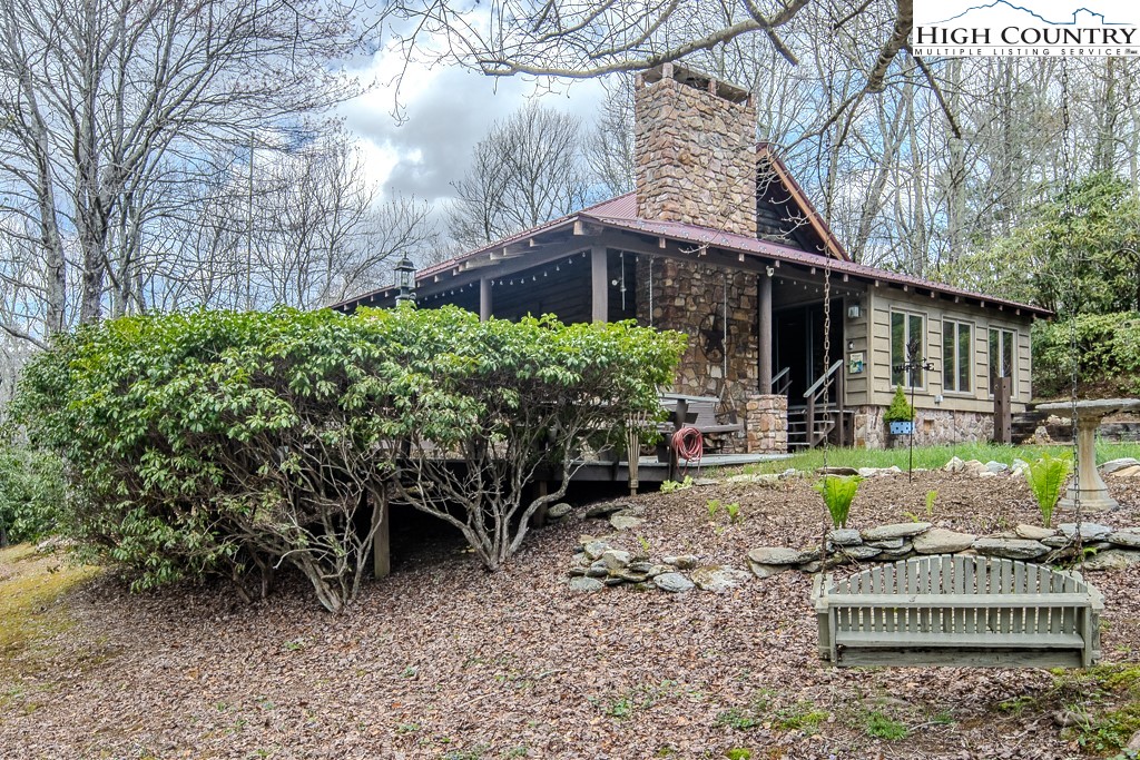 80 Avery Co High School Road Newland, NC 28657 - Photo 28 of 36 a front view of a house with garden